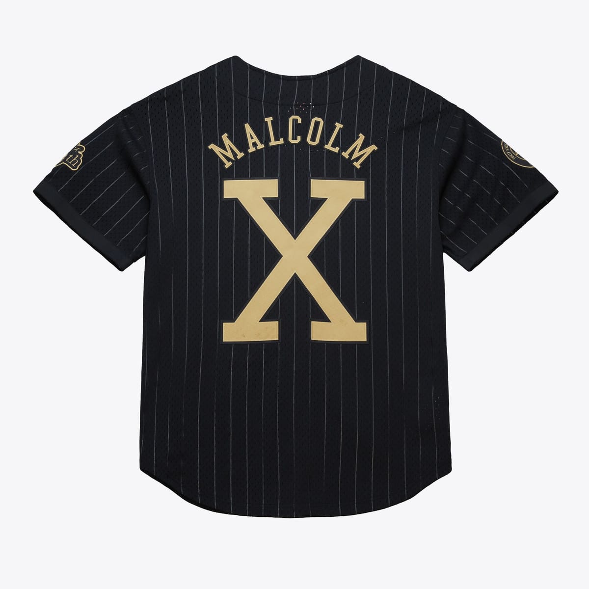 Spike Lee  x Mitchell & Ness Honor Malcolm X’s 100th Birthday with Capsule Collection