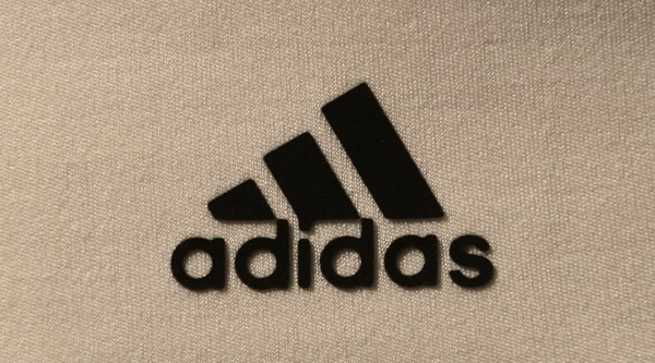 Adidas Shares Tumble After Sales Miss and Tariff Warning