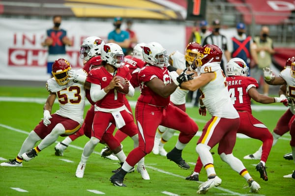 Quarterback Kyler Murray drops back to pass during an Arizona Cardinals game