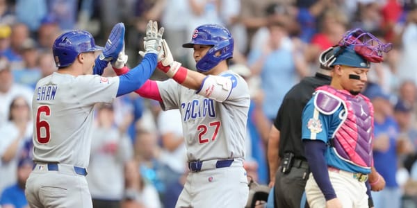 Chicago Cubs and Milwaukee Brewers players during an NL Central matchup